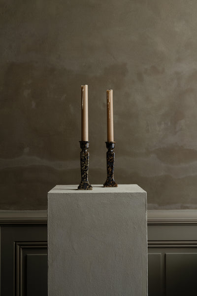 Pair of sandstone candle holders