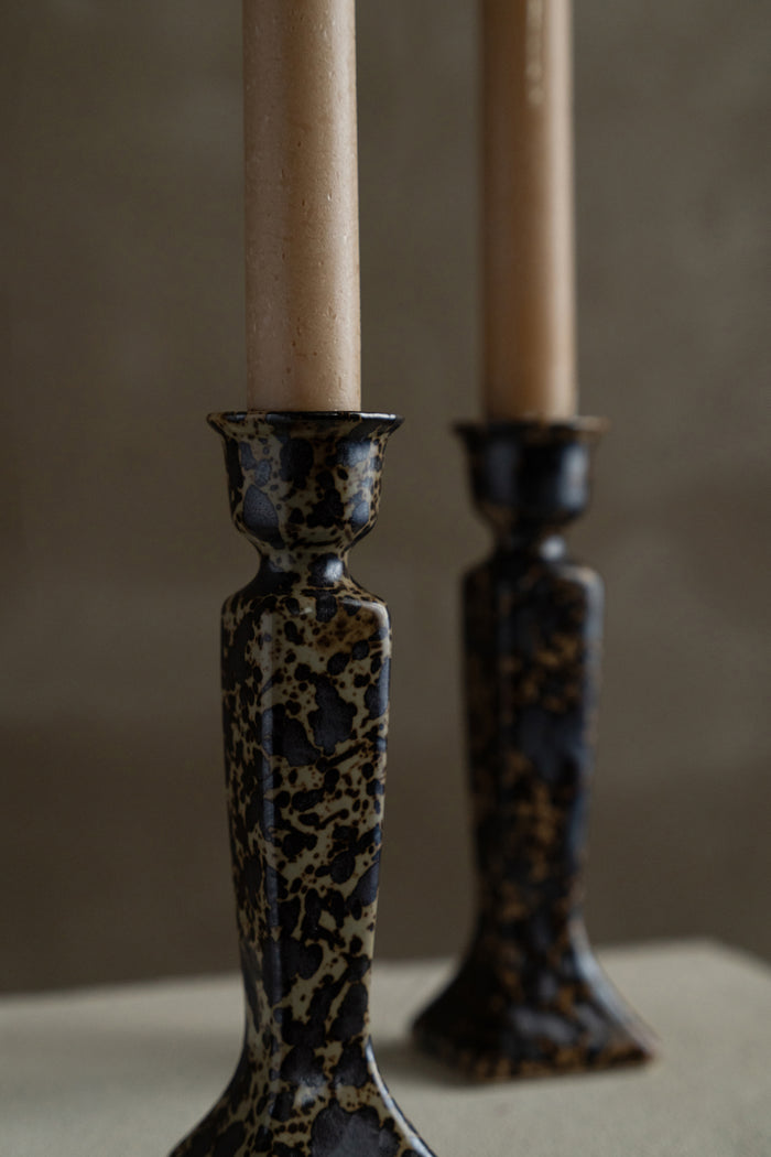 Pair of sandstone candle holders